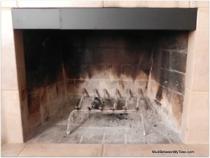 The smoke guard is a metal barrier that fits into the top of your fireplace opening.