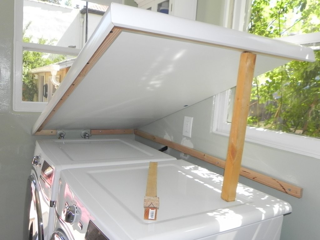 This shows how the counter doesn't have to be fastened into place - it sits atop the ledger board, as well as support boards resting on the top of the washer and dryer. 